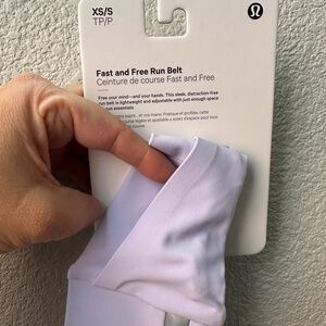 Lululemon Athletica Fast and Free Run Belt in Lavender.